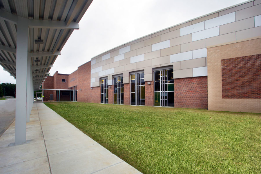 Photo of metal panels and colored glass storefront at St. Amant Freshman Academy