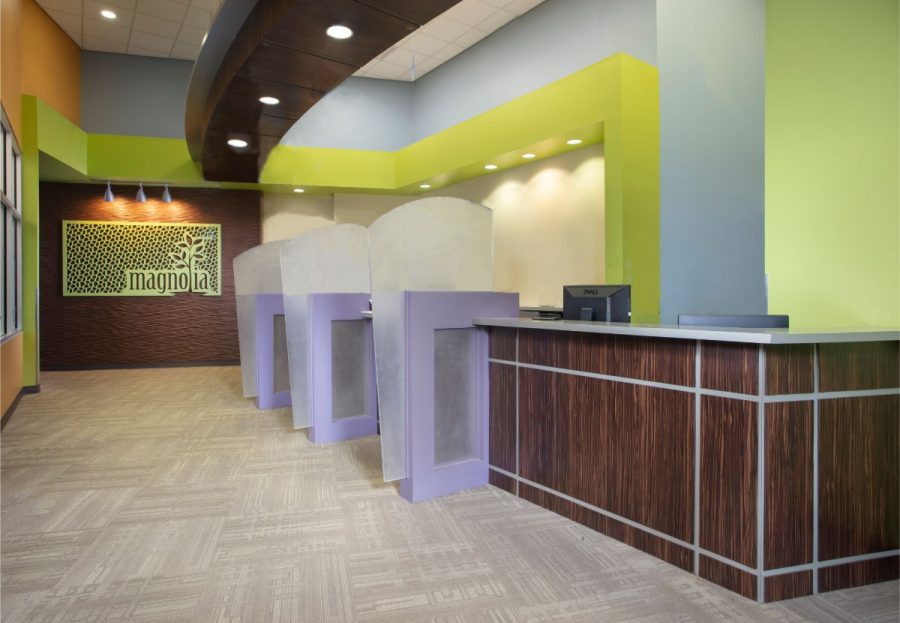 Checkout desk with frosted glass privacy panels