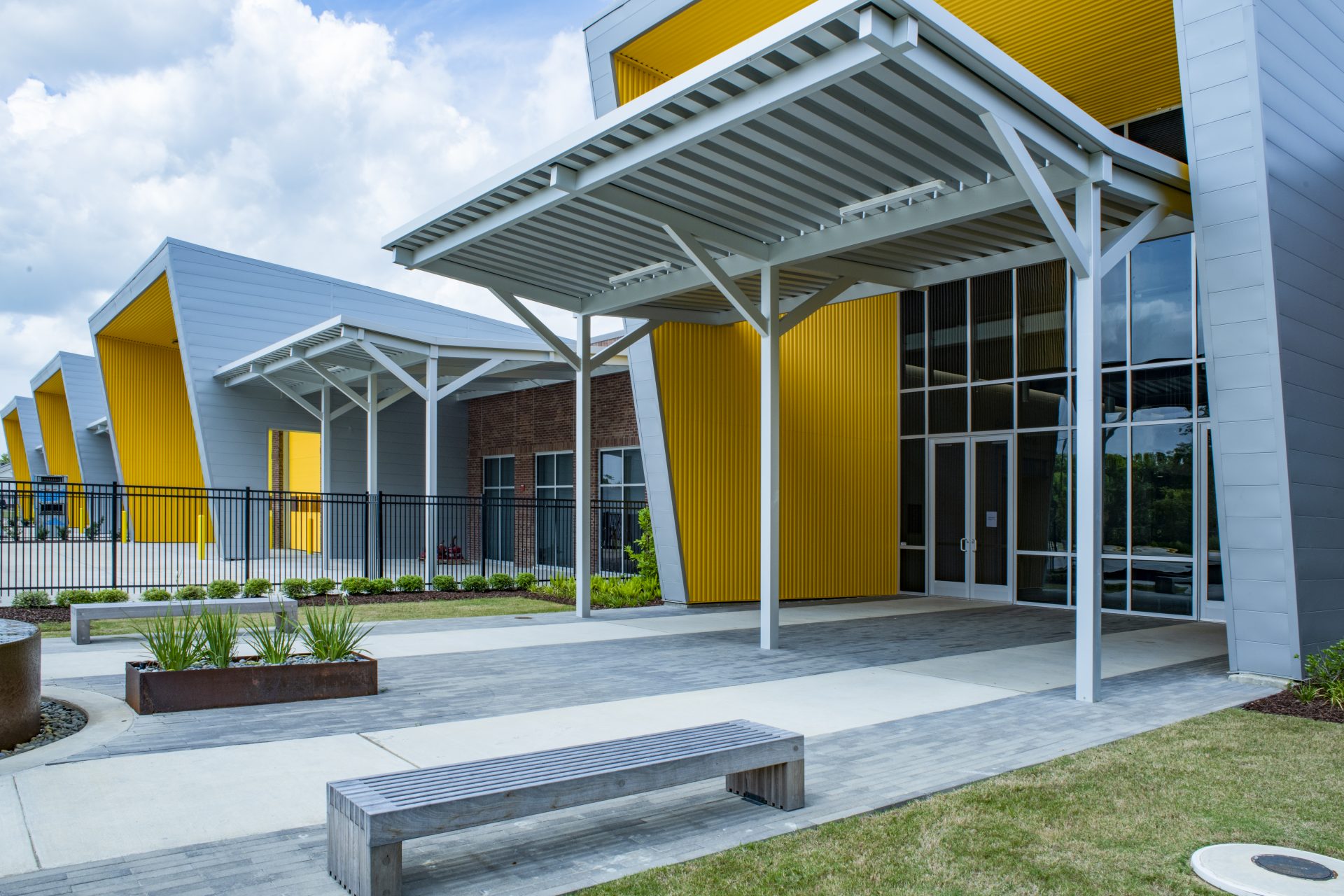 Exterior of EBR-CTEC with contemporary landscape and concrete benches