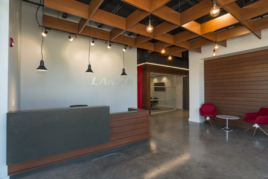 Reception area that shows the inviting red wood accents.