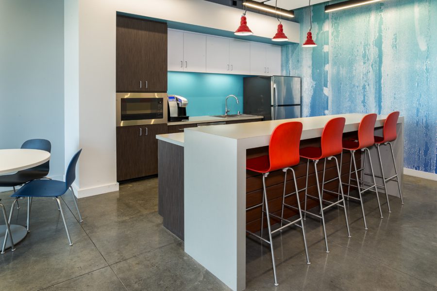 Inviting break room and kitchen with abstract wall covering