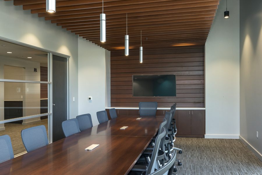 Conference room with redwood accents and large conference table