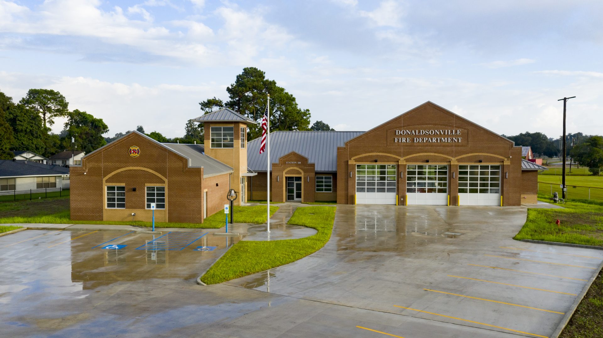 Exterior of the Donaldsonville Fire Station including the parking lot.