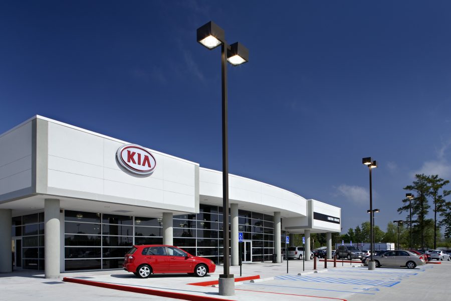 Exterior of All Star Kia during the day.