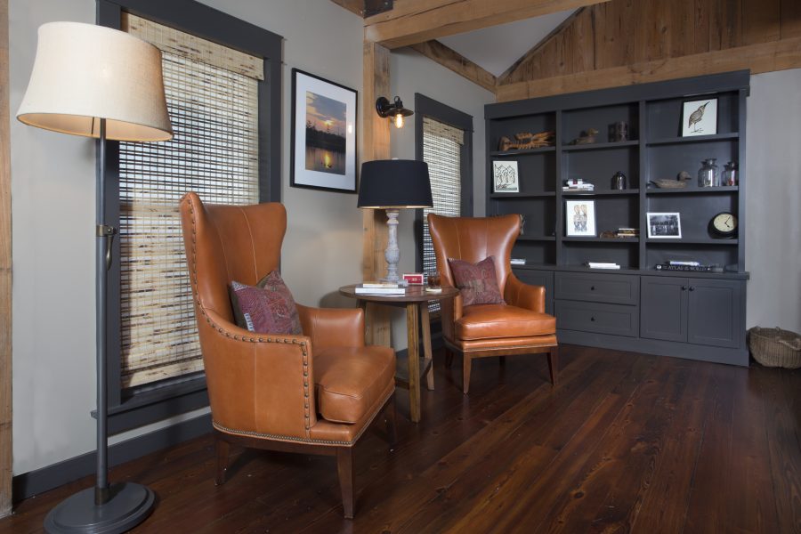 Sitting area with leather chairs.