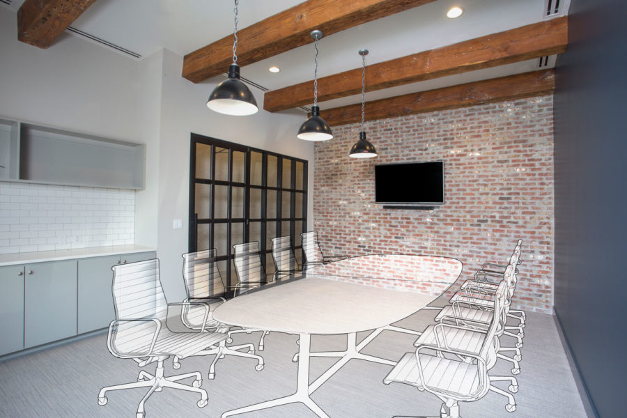 Conference room with black framed storefront, black warehouse pendants, wood beams, and a brick feature wall