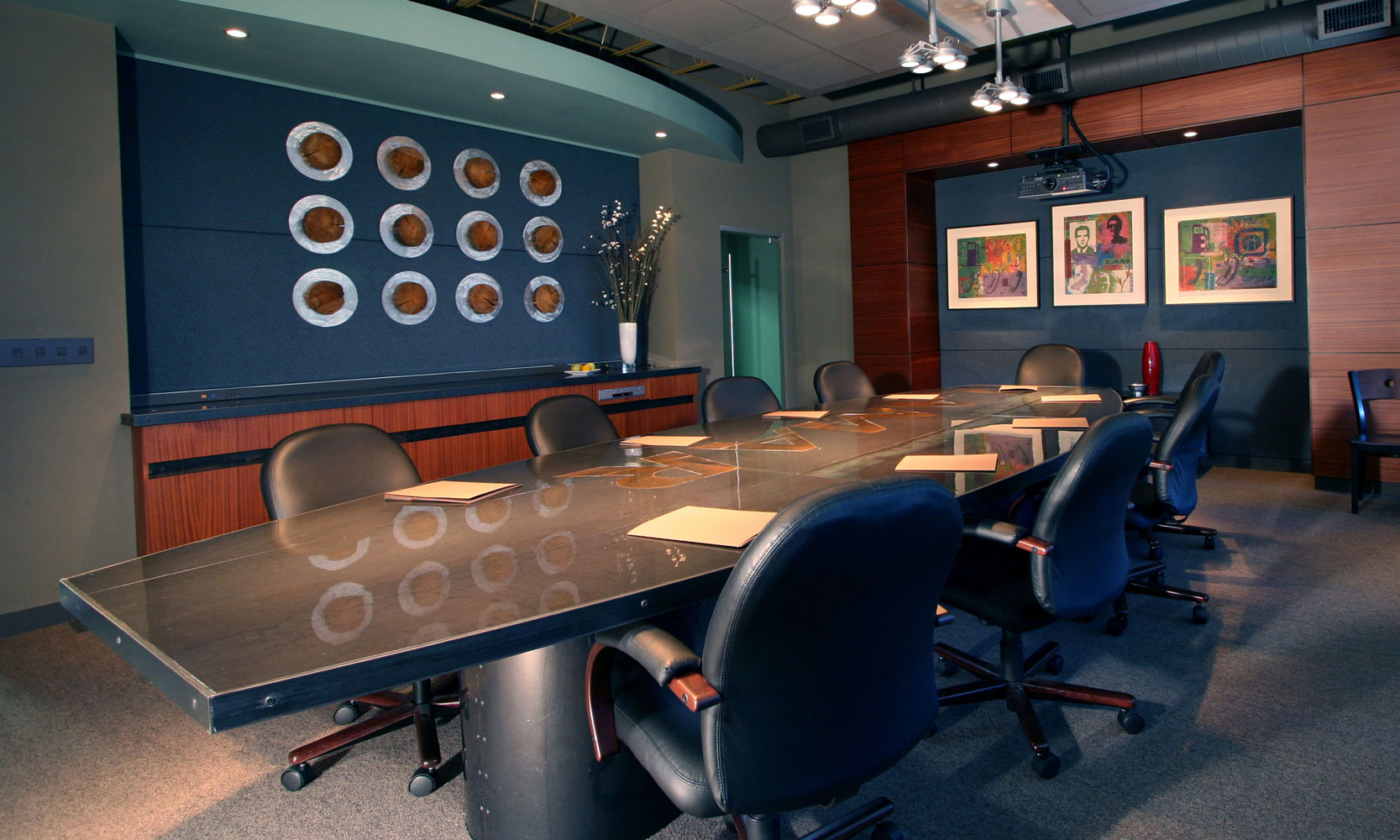 Board room with dark blue and wood accents