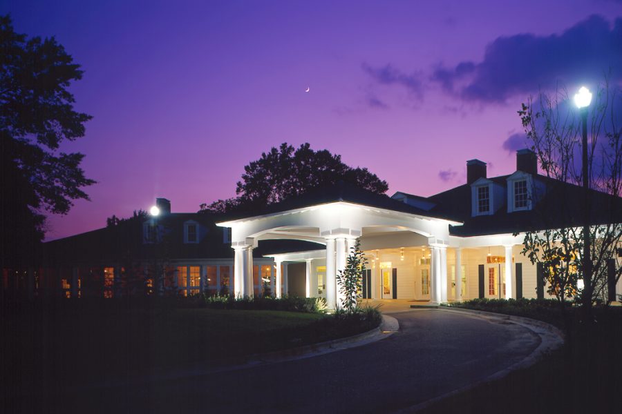 Exterior of St. James Place at night.